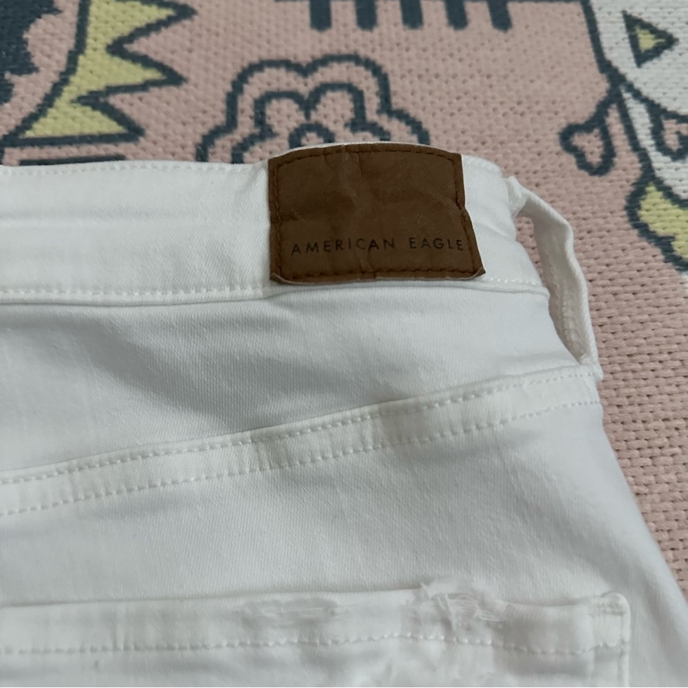 American Eagle White Stretch Ripped Super Hi-Rise Jegging Crop Jeans - Picture 15 of 16